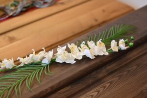 Sarg mit Blumen